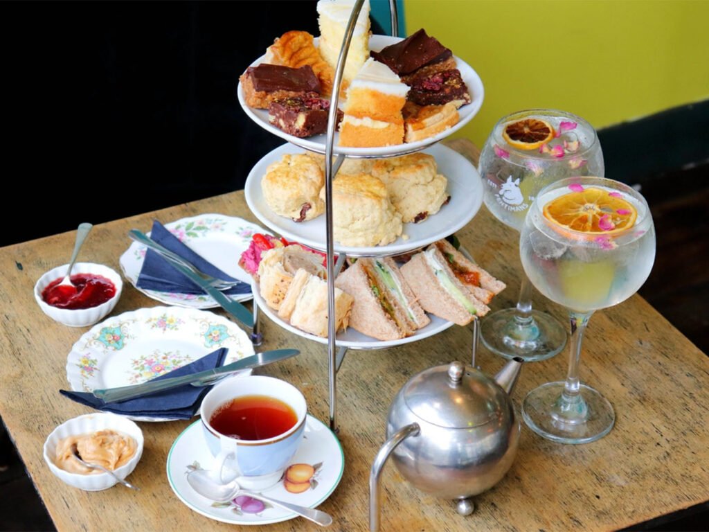 Afternoon tea with fresh cakes and sandwiches at Metro Deco