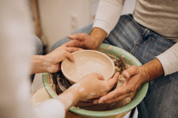 Couple doing pottery