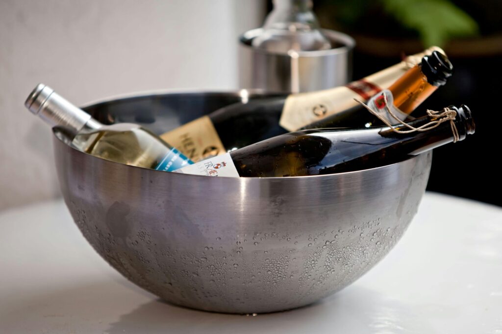 Open sparkling wine in an ice bucket to store