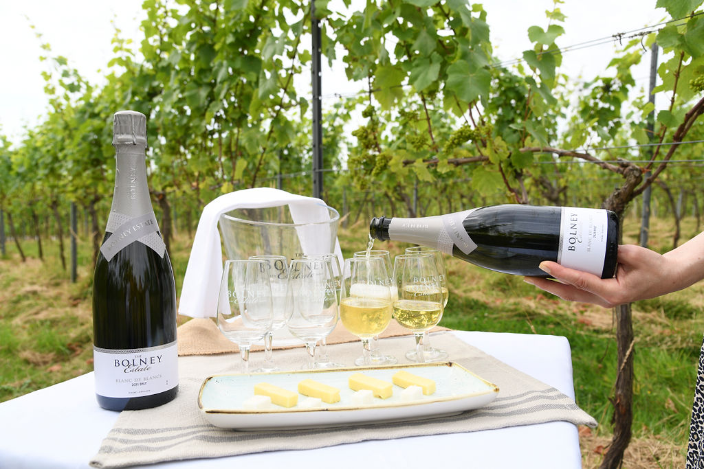 English sparkling wine served on a picnic table in an English vineyard
