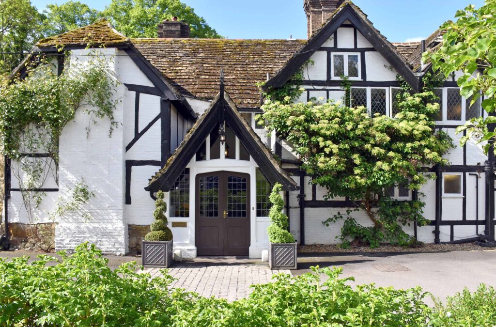 Front view of Ockenden Manor Hotel in Sussex