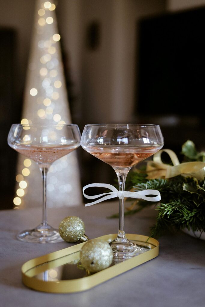 Sparkling wine at Christmas with white bow