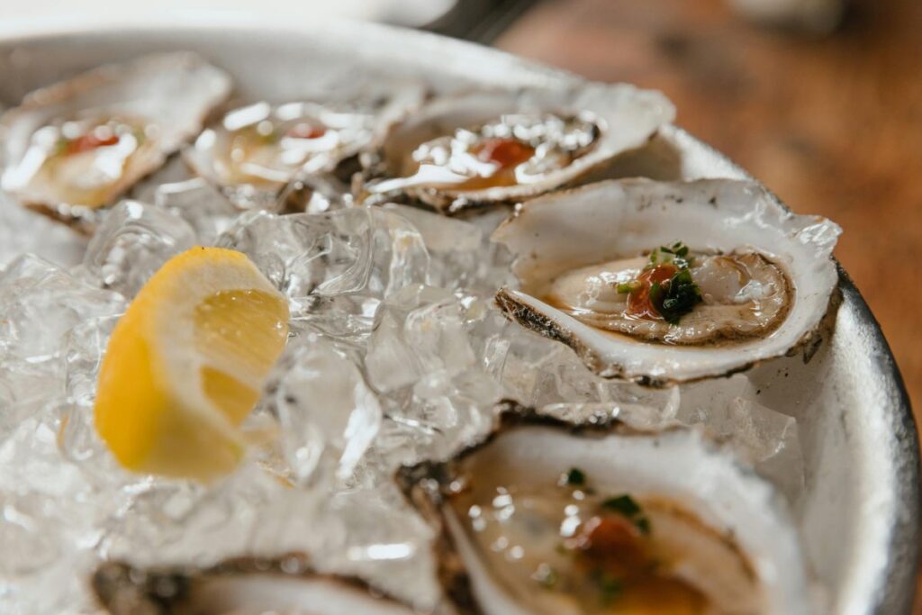 Oysters on ice with lemon