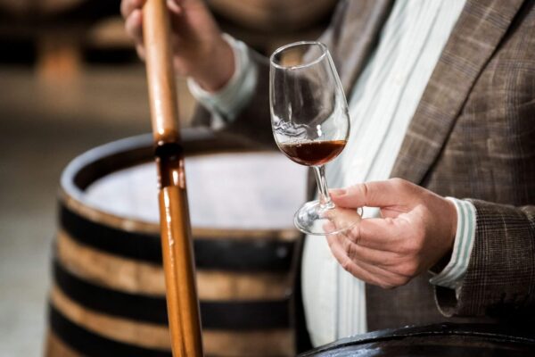 Winemaker tasting wine