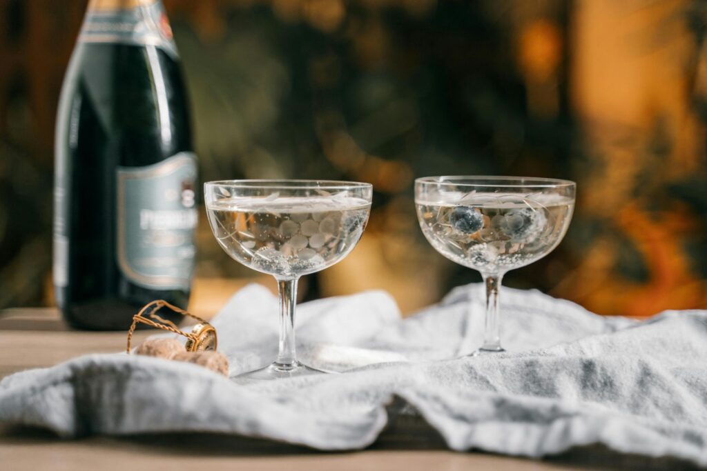 Two coupe glasses with Champagne