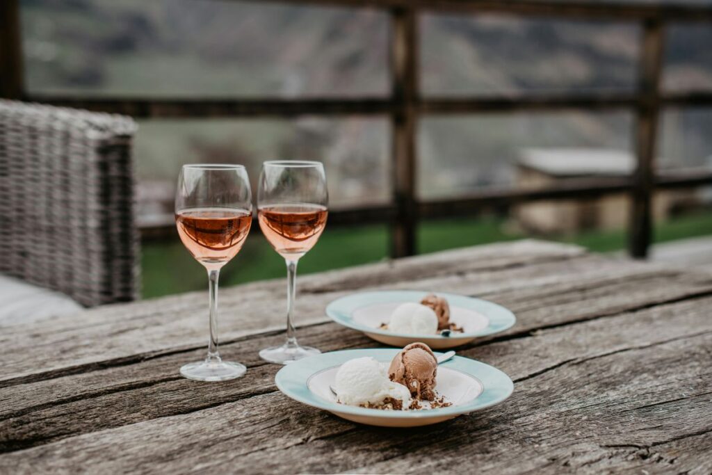 Two glasses of rose wine with icecream