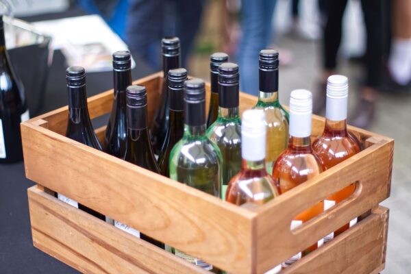 A crate of red, white, and rose still wine