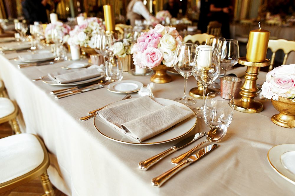Sparkling wine and still wine glasses on a wedding dinner table