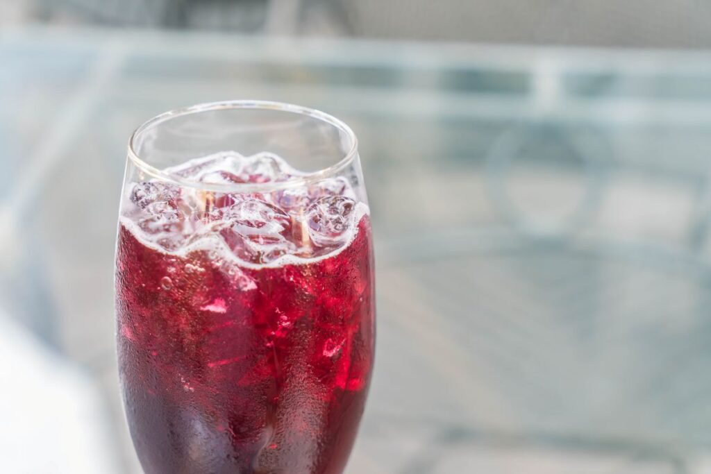 Sparkling red wine in a tulip wine glass
